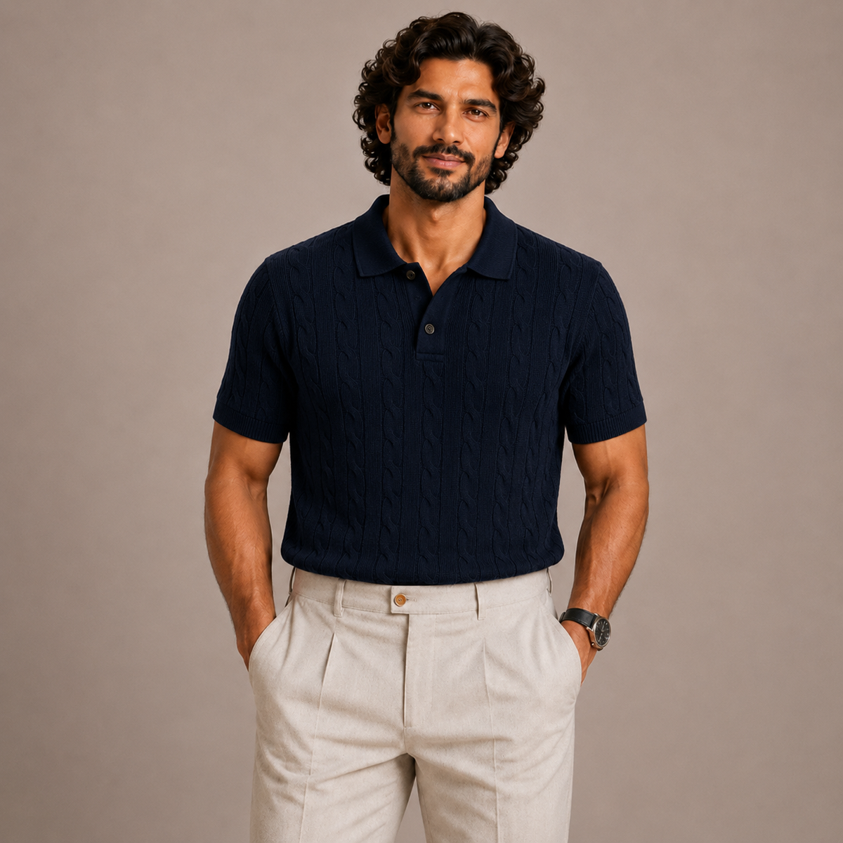 Man wearing Juliet Parkar's Navy Blue Cable Knit Polo with beige trousers